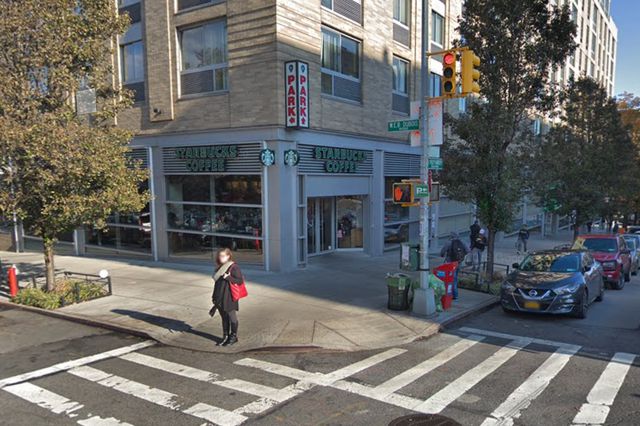 A street view image of West 145th Street and Bradhurst Avenue, showing the Starbucks on the corner.